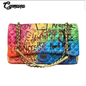 NWOT graffiti overnight bag